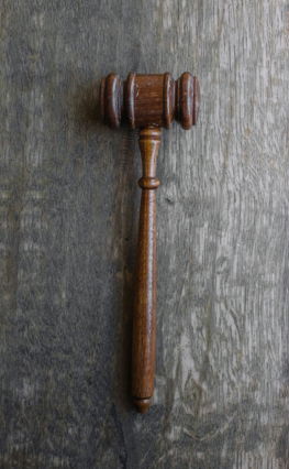brown mallet on gray wooden surface